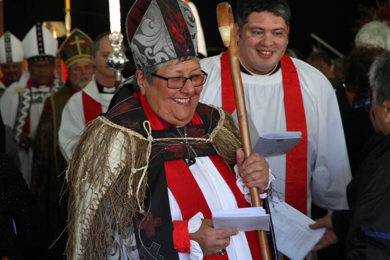 Bishop Waitohiariki processes out of the service followed by the three archbishops.