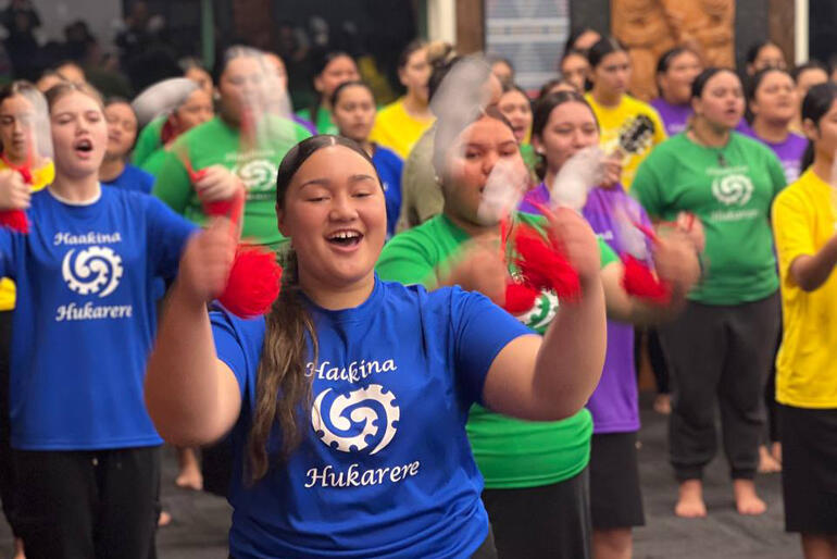 Head Girl Zsana Dimitro front the poi lines during the school's wananga this May, their first chance to be together since February.