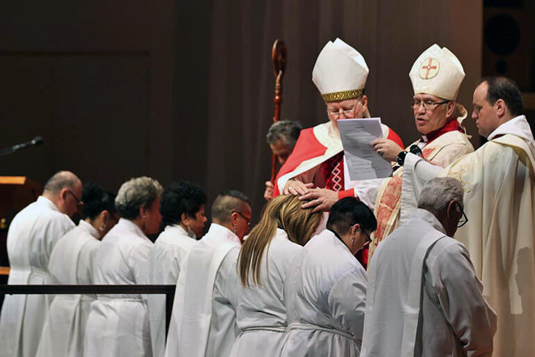 Bishop Ngarahu Katene and Bishop George Connor lay hands in ordination on Rev Joanna Katipa from Tuakau.