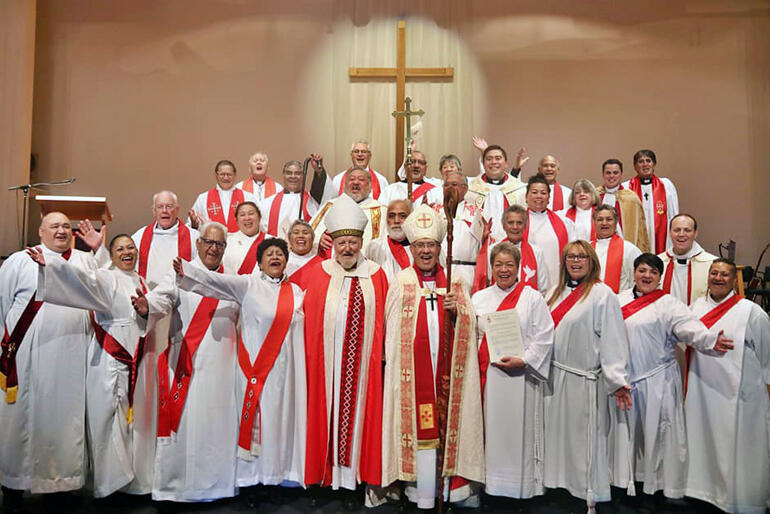 Clergy from Te Pīhopatanga o Te Manawa o Te Wheke back up Bishop Ngarahu Katene, Bishop George Connor and the eight new deacons.