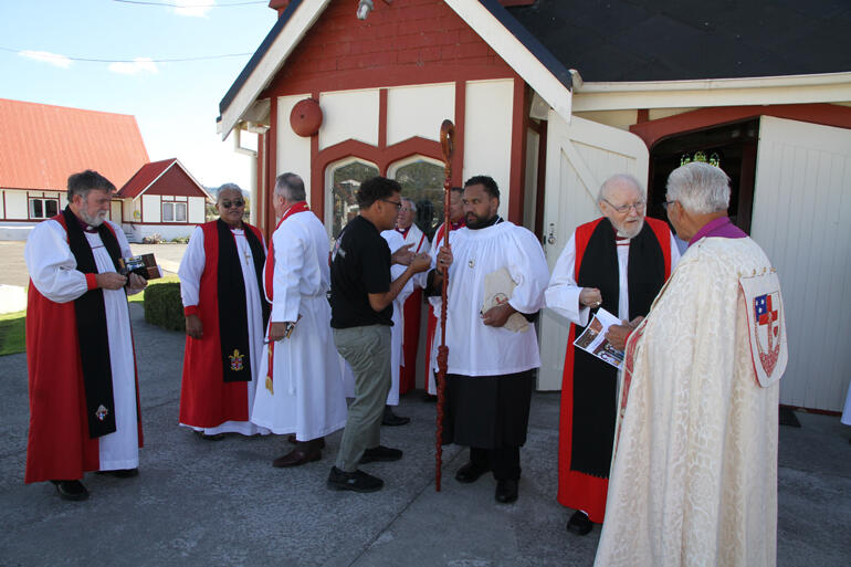 Bishop Ngarahu Katene chats with old friend Bishop George Connor as clergy prepare to enter St Faith's Ohinemutu. Bishop Ngarahu Katene chats with old friend Bishop George Connor as clergy prepare to enter St Faith's Ohinemutu.