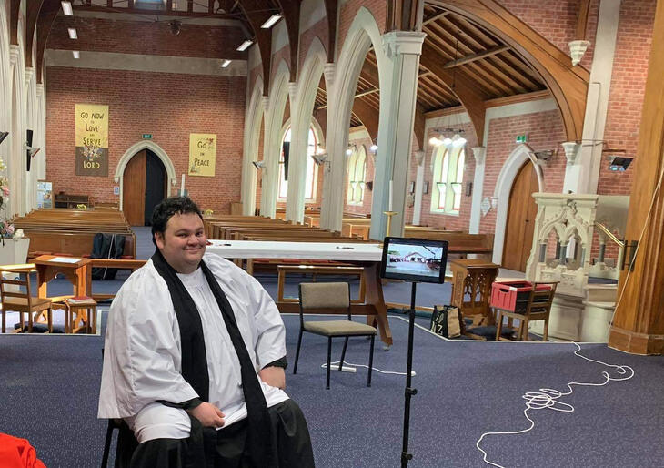Rev Zhane Tahau Whelan and one of the recording tablets get ready for online karakia from Holy Trinity Gisborne.