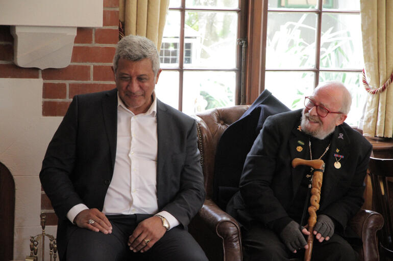 John Walters and Rev Wiremu Quedley listen to Rev Dr Wayne Te Kaawa's story of how his uncle discovered Muru Walters' sporting talent.