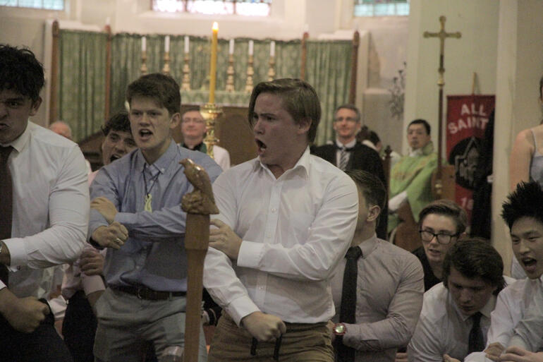 Selwyn College Student President Nic Sinnott (with bone carving) leads Te Maru Pūmanawa - Selwyn College haka.