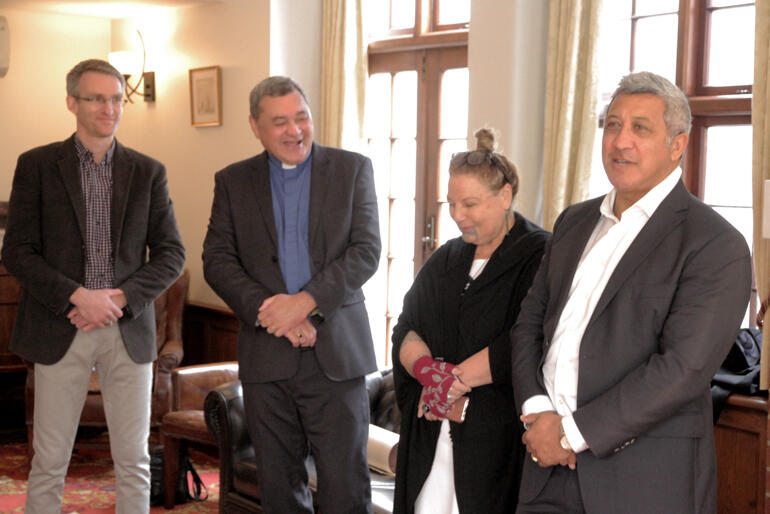 Selwyn College Warden Luke McClelland, Rev Dr Wayne Te Kaawa, Christine Maxwell and John Walters share a light moment at the fellowship reception.