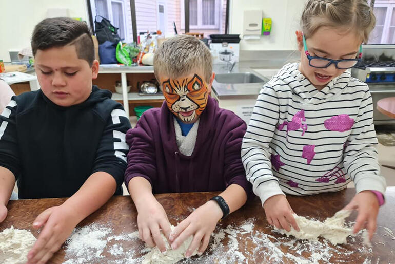 Three Tamariki take part in the Te Aka Kura Rātapu pilot project at St Paul's Te Puke.