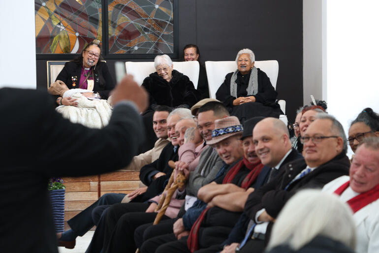 A speaker during the pōhiri at Te Waipounamu winds up his crowd as Bishop Susan and Te Makau Ariki Atawhai look on.