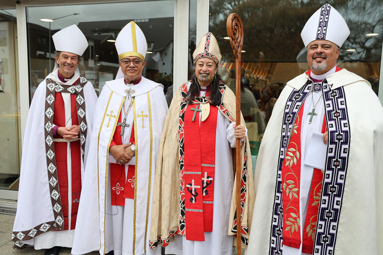 Newly ordained Bishop Susan Wallace stands with Archbishop Justin Duckworth, Archbishop Sione Ulu'ilakepa and Archbishop Don Tamihere.