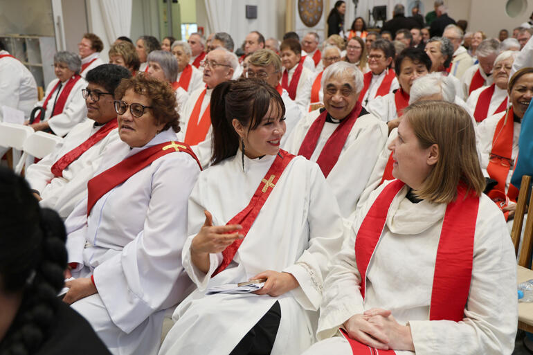 Rev Tamsyn Kereopa meets a friend as clergy gather in the centre of the Cathedral.