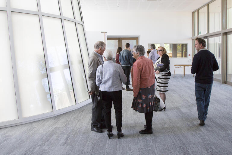 Visitors gather in the atrium outside the All Souls' entrance chapel.