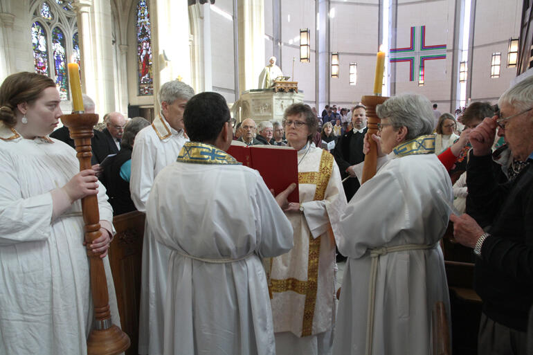 Rev Susan Slaughter, deacon at Holy Trinity Invercargill, reads the Gospel.