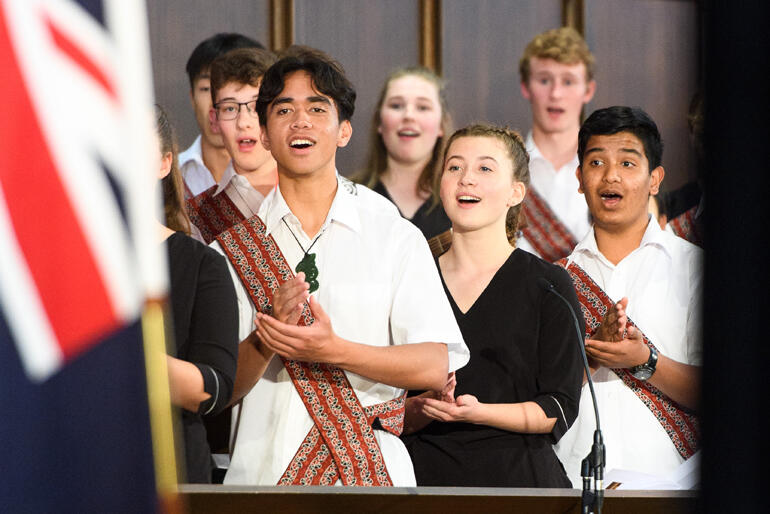 Members of the New Zealand Secondary Schools Choir sing 'Wairua Tapu' by the Wehi whānau.