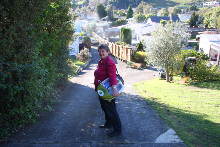 Back in 2015: parish nurse Jane Wulff heads out with a footspa. Today heavy pressure on nurses has hit pause on parish nursing in New Zealand.