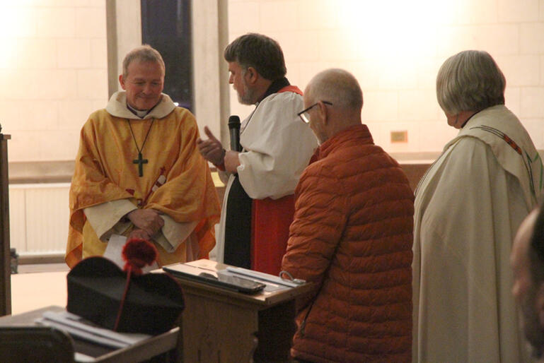 Archbishop Philip Richardson thanks +Steven for his service as Andrew Metcalfe and Archdeacon Jan Clark look on.