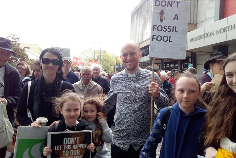 Beck Hickman, Rev Andy Hickman and family turn up to the climate strikes as part of their ongoing protests against fossil fuel extraction.