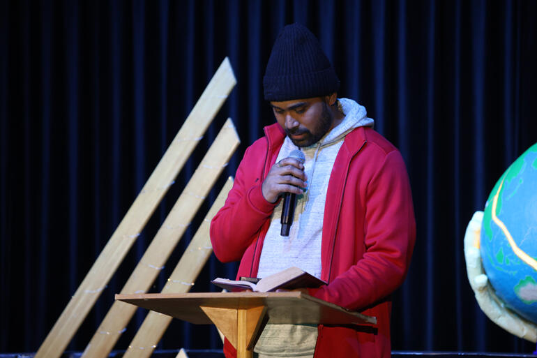 Diocese of Polynesia Youth Coordinator 'Alokoulu 'Ulukivaiola reads scripture during The Abbey's opening worship. Diocese of Polynesia Youth Coordinator 'Alokoulu 'Ulukivaiola reads scripture during The Abbey's opening worship.