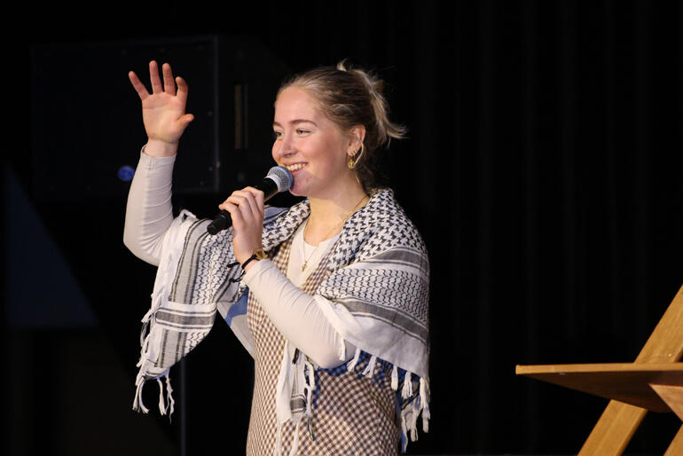 Morgyn Jakob from Urban Vision in Newtown guides the crowd, wearing her solidarity with the innocents of Palestine. Morgyn Jakob from Urban Vision in Newtown guides the crowd, wearing her solidarity with the innocents of Palestine.