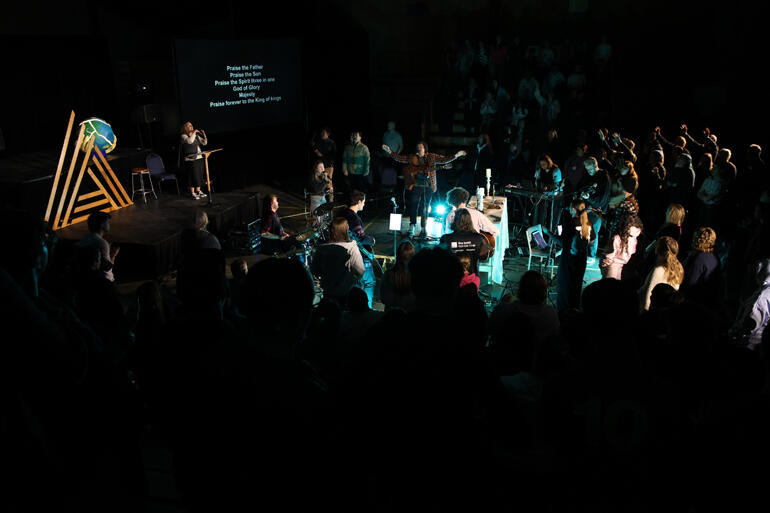 The Abbey gather in worship with their 'A' for Abbey logo symbolising going "Up, Out, In" at El Rancho Camp in Waikanae, 23 August 2025. The Abbey gather in worship with their 'A' for Abbey logo symbolising going "Up, Out, In" at El Rancho Camp in Waikanae, 23 August 2025.