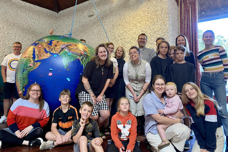 Members of Wellington Cathedral of St Paul's cafe church celebrate making their submissions to the Climate Commission.