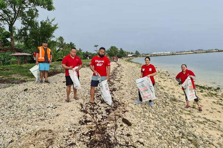Tongan youth take part in one of the Anglican Church's 'No Pelestiki' campaign beach clean ups.