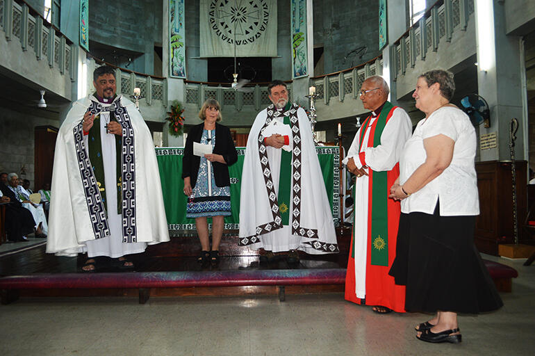 Archbishop Don Tamihere speaks to Rev Sue Halapua, at right. That's Belinda Holmes between the two archbishops.