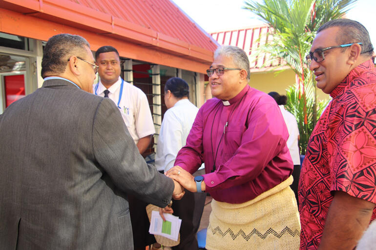Archbishop Sione Ulu'ilakepa welcomes PCC Moderator, Elder Dr Leatulagi Faalevao of The Congregational Church of American Samoa.