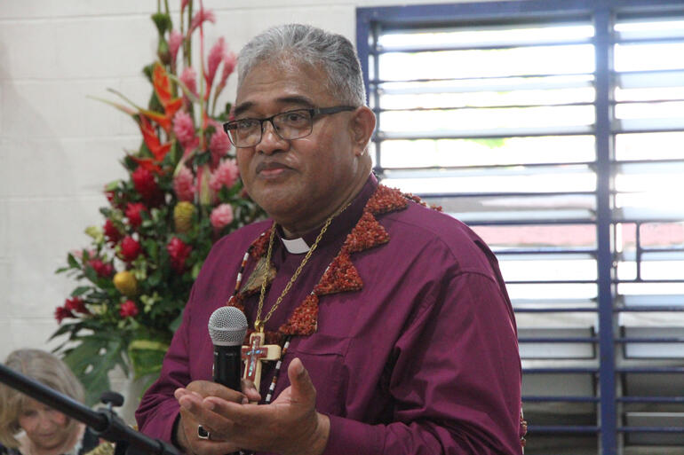 Archbishop Sione offers the final blessing to conclude his ordination day festivities.