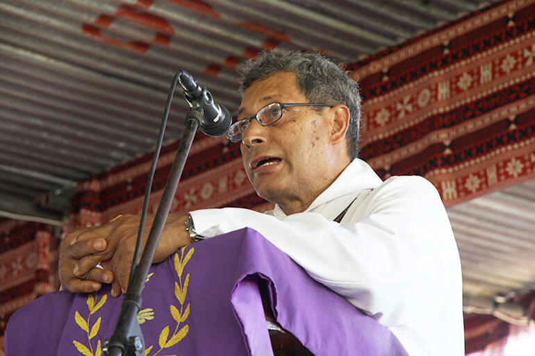 Fr Gerald Billings, Vicar of St Thomas' Labasa, welcomes people to the service. He and Henry Bull are lifelong friends.