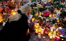 Flowers are placed in Oslo in response to the killings in Norway. 