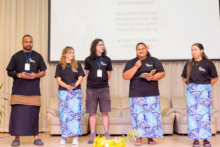 ANZP Anglican delegates teach 'Wairua Tapu' to the Assembly before worship begins.