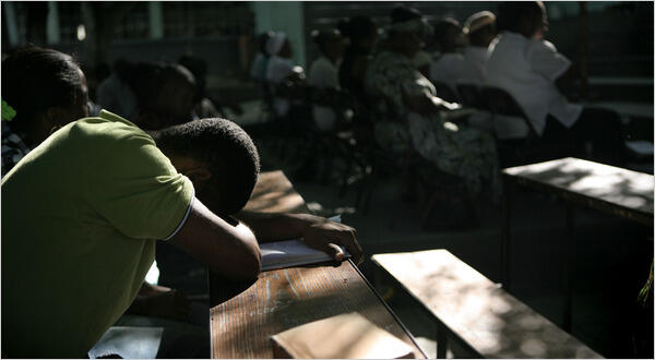 Haitians seek solace amid the ruins of Port-au-Prince.