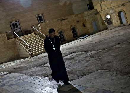 Many Iraqi Christians are losing hope after further violence. - New York Times picture.