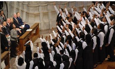 The Children of the Gospel Choir sing "He's Got the Whole World in his Hands" in Washington National Cathedral.