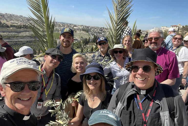 St George's pilgrims carry palm fronds as they join the Palm Sunday celebration during an 'Easter in Jerusalem' pilgrimage. St George's pilgrims carry palm fronds as they join the Palm Sunday celebration during an 'Easter in Jerusalem' pilgrimage.