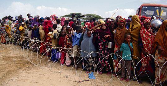 Refugees queue for aid in Somalia. 